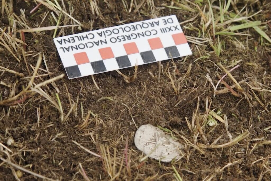 A 400-year-old silver coin unearthed near the Strait of Magellan has pinpointed the exact location of a doomed Spanish colony where most of 350 settlers perished within years.