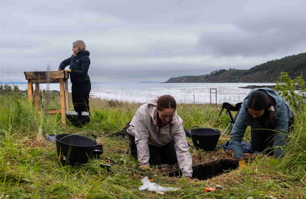 A 400-year-old silver coin unearthed near the Strait of Magellan has pinpointed the exact location of a doomed Spanish colony where most of 350 settlers perished within years.