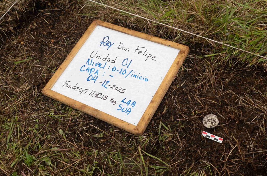 A 400-year-old silver coin unearthed near the Strait of Magellan has pinpointed the exact location of a doomed Spanish colony where most of 350 settlers perished within years.