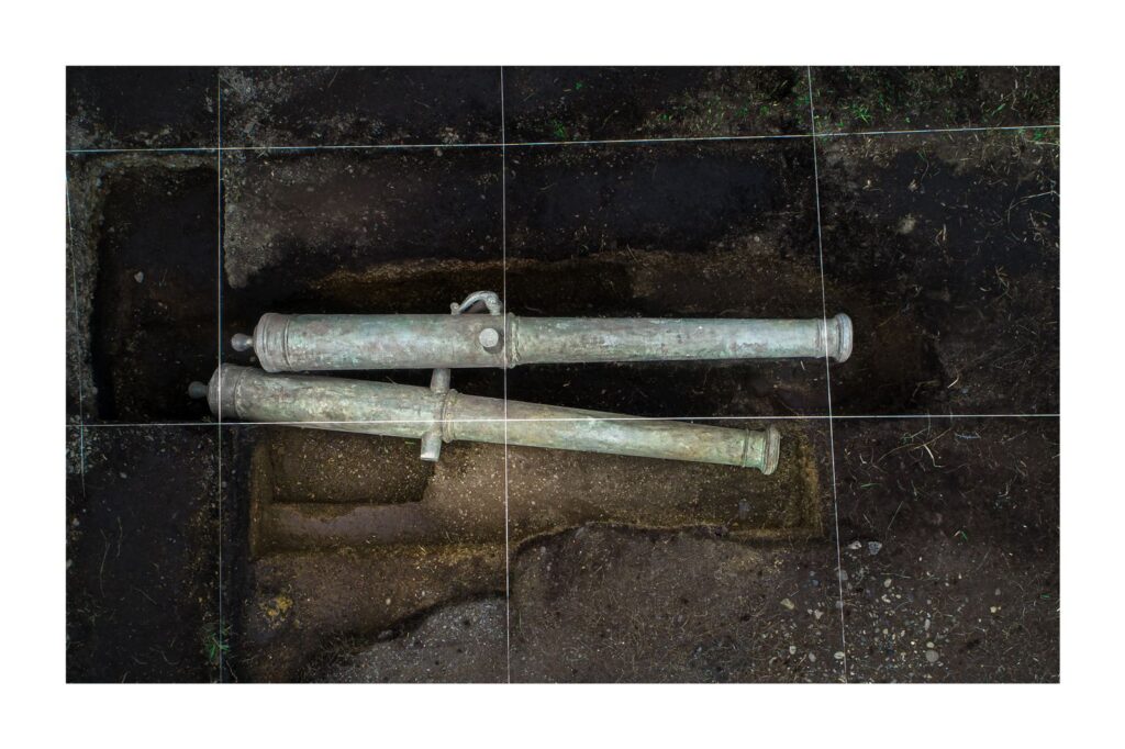 A 400-year-old silver coin unearthed near the Strait of Magellan has pinpointed the exact location of a doomed Spanish colony where most of 350 settlers perished within years.