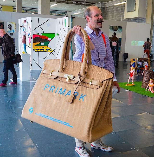 An artist is selling a supersized Sainsbury's bag for life inspired by the Hermes Birkin for £740,000. Vinay Hathi has also made giant versions of Sports Direct and Primark bags.