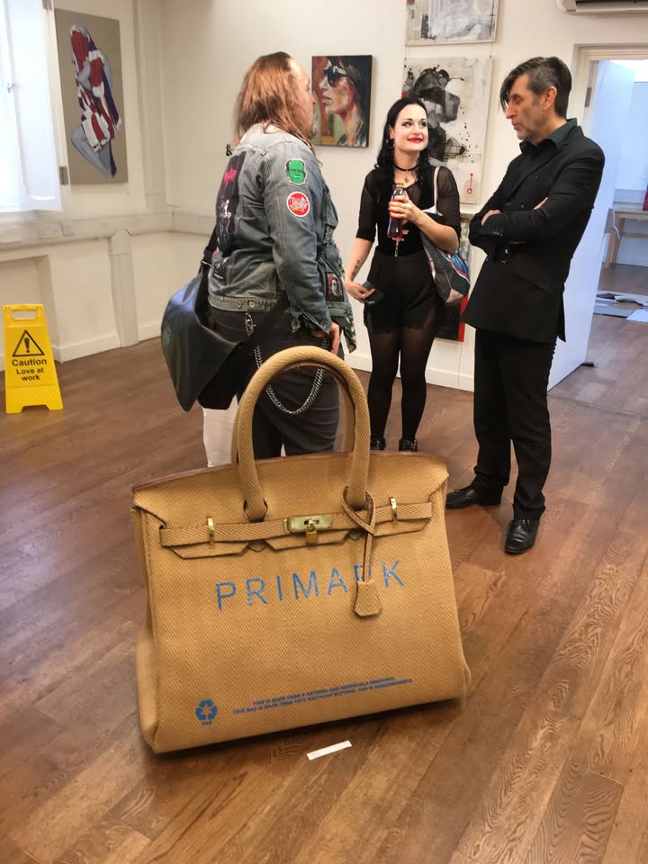 An artist is selling a supersized Sainsbury's bag for life inspired by the Hermes Birkin for £740,000. Vinay Hathi has also made giant versions of Sports Direct and Primark bags.