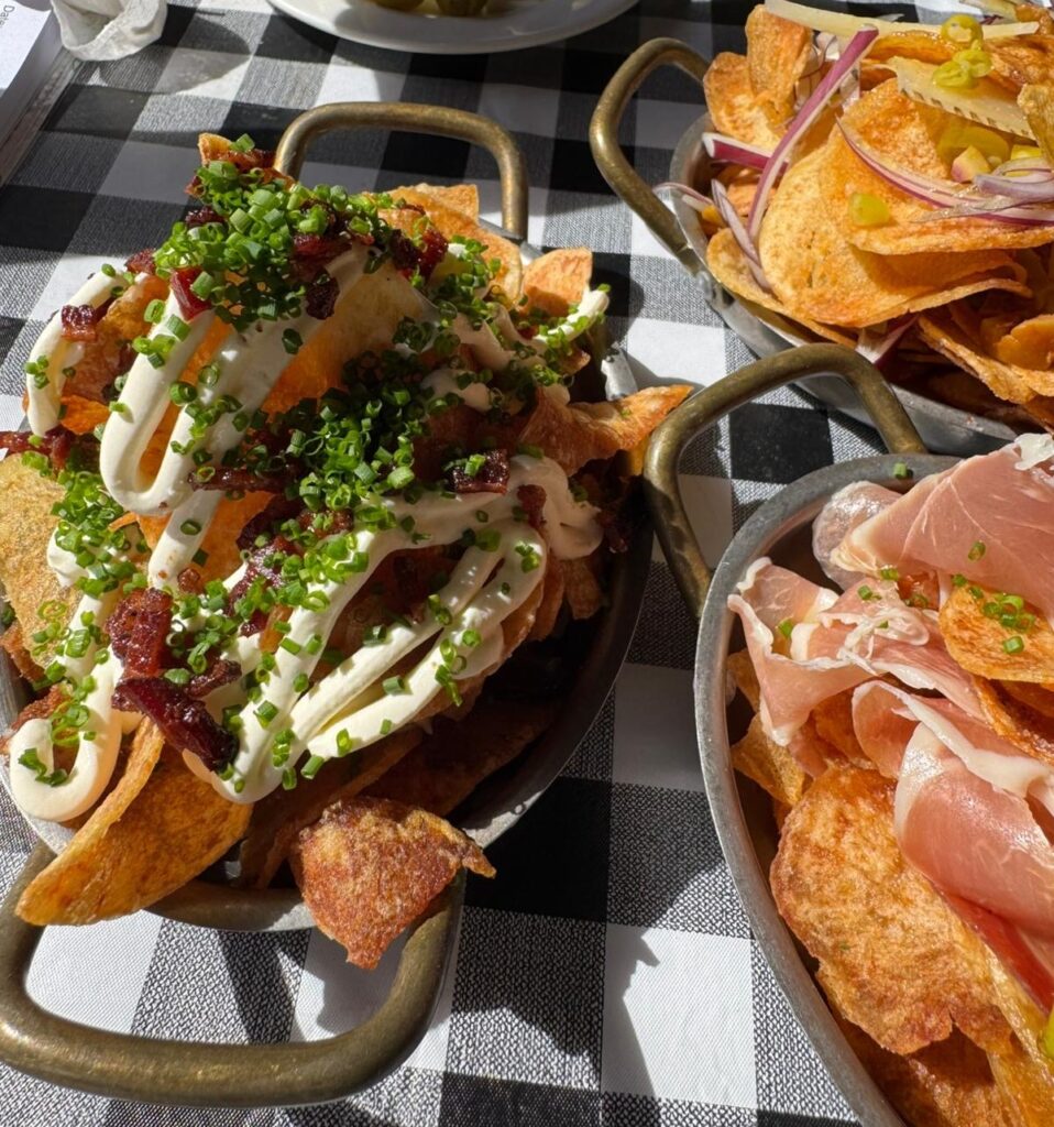 A new London venue is serving what could be Britain's most expensive bar snack, with crisps topped with beluga caviar hitting a staggering £65 on the menu at The Lucky Goat.