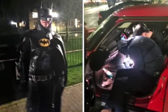 Two Brits got their car stuck in a Cotswolds river and could not believe it when Batman turned up to help. The bizarre rescue clip has gone viral with over 490,000 views.