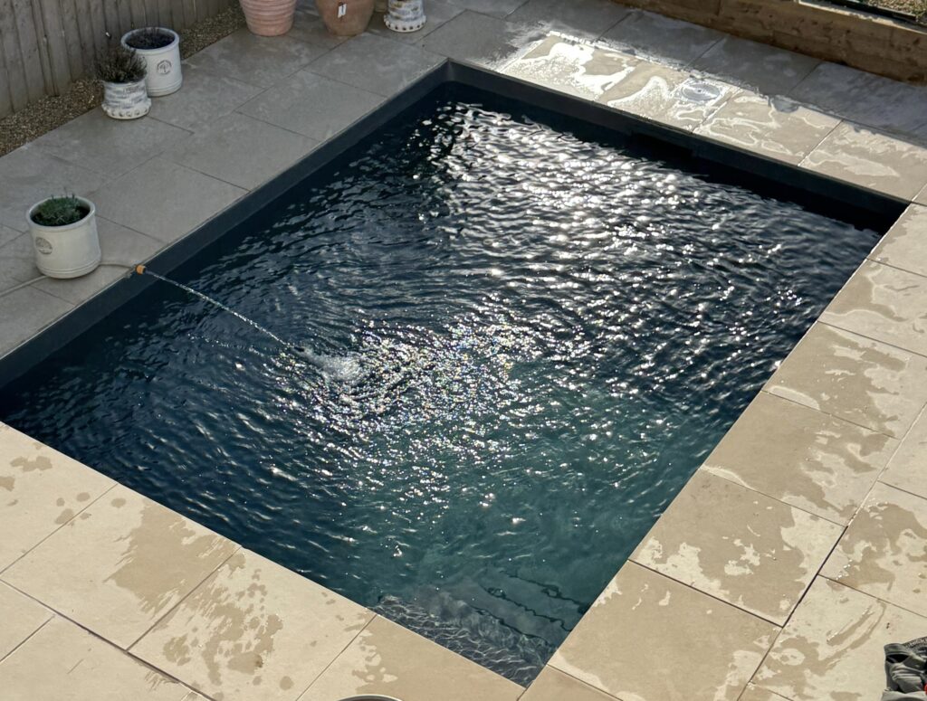 A couple spent £6,700 and eight months building their own DIY pool in their Suffolk garden. They did every bit of the work themselves - and friends are already asking for invites.