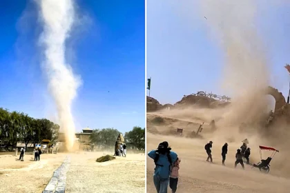 A dramatic dust devil sent visitors scramblinag for cover as it tore through a famous Chinese Western film studio - but officials say it caused no damage and the park stayed open.