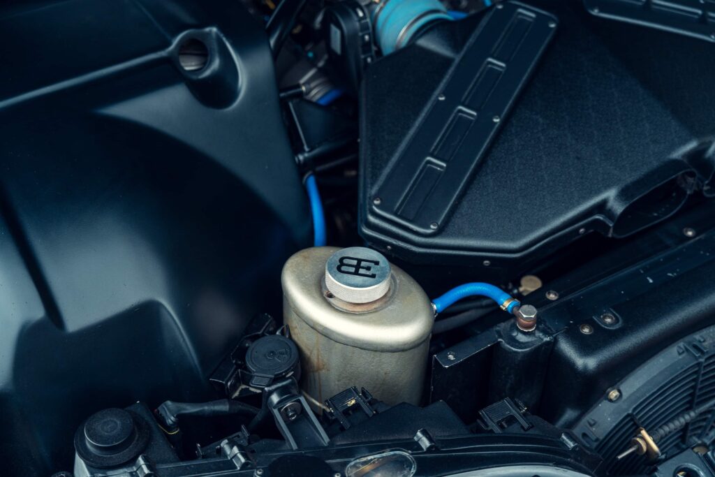 One of just three surviving 1999 Bugatti EB112s, with only 23 miles on the clock, is heading to the Monaco auction block with a jaw-dropping £1.75 million guide price.