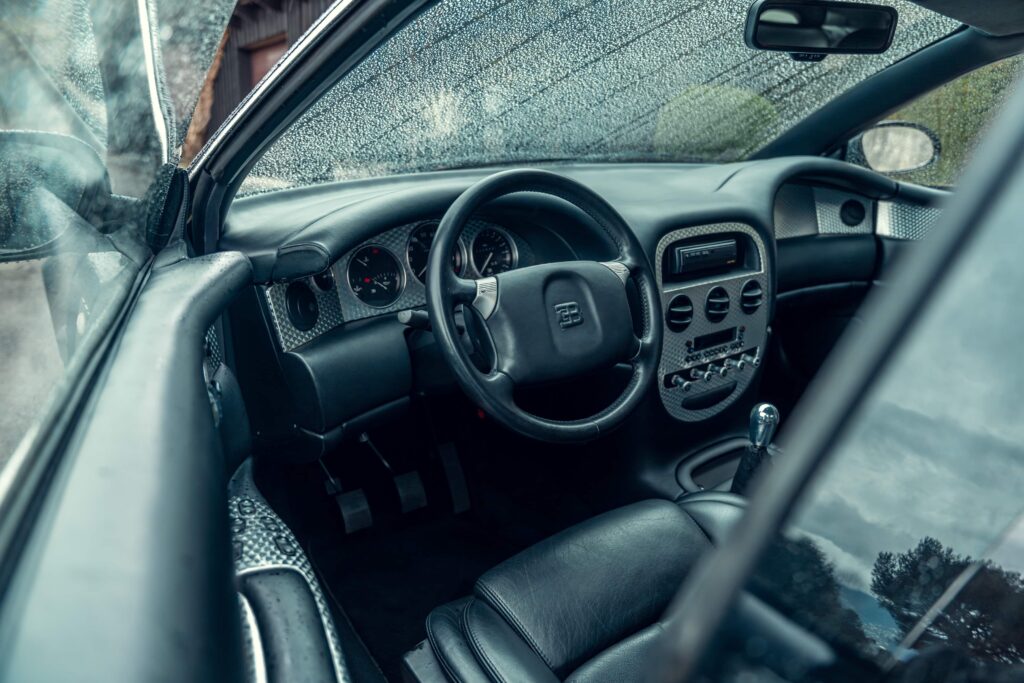 One of just three surviving 1999 Bugatti EB112s, with only 23 miles on the clock, is heading to the Monaco auction block with a jaw-dropping £1.75 million guide price.