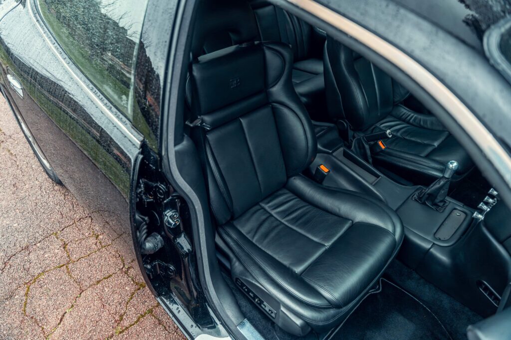 One of just three surviving 1999 Bugatti EB112s, with only 23 miles on the clock, is heading to the Monaco auction block with a jaw-dropping £1.75 million guide price.