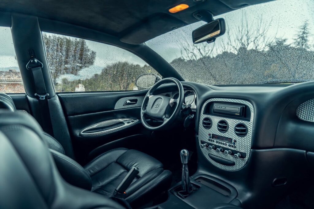 One of just three surviving 1999 Bugatti EB112s, with only 23 miles on the clock, is heading to the Monaco auction block with a jaw-dropping £1.75 million guide price.