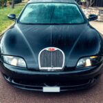 One of just three surviving 1999 Bugatti EB112s, with only 23 miles on the clock, is heading to the Monaco auction block with a jaw-dropping £1.75 million guide price.