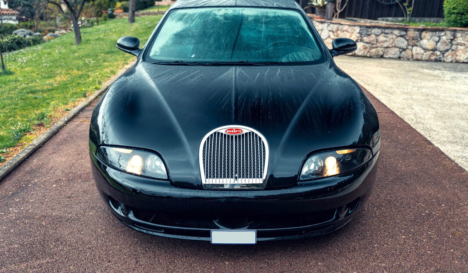 One of just three surviving 1999 Bugatti EB112s, with only 23 miles on the clock, is heading to the Monaco auction block with a jaw-dropping £1.75 million guide price.