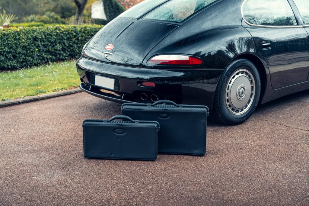 One of just three surviving 1999 Bugatti EB112s, with only 23 miles on the clock, is heading to the Monaco auction block with a jaw-dropping £1.75 million guide price.