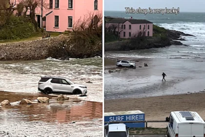 A driver parked on a beach and panicked as the tide swallowed their car. The tense rescue was caught on camera and has since gone viral with over 7.5 million views online.