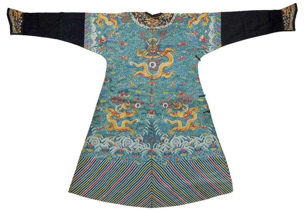 A British family discovered their communist grandmother's Chinese souvenir chest contained a £40,000 Imperial art collection, including a 230-year-old Qing dynasty dragon robe.