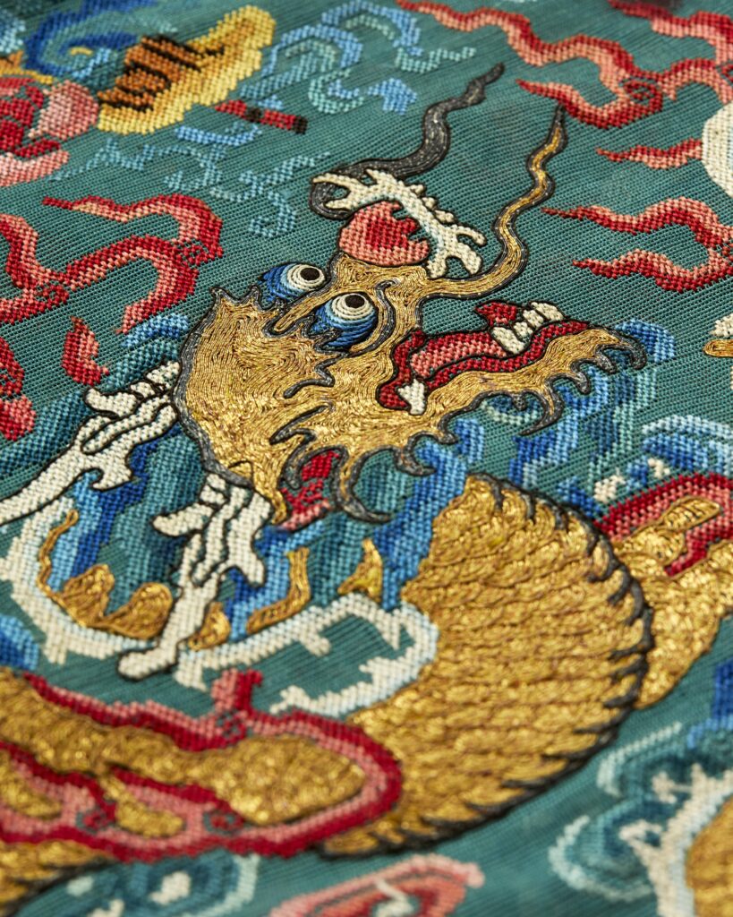 A British family discovered their communist grandmother's Chinese souvenir chest contained a £40,000 Imperial art collection, including a 230-year-old Qing dynasty dragon robe.