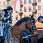 A knight proposed to his lady jouster in full armour after a tournament at a British armoury museum, leaving her in tears after 12 years of friendship finally turned to romance.