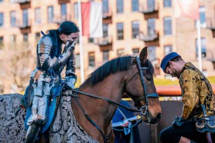 A knight proposed to his lady jouster in full armour after a tournament at a British armoury museum, leaving her in tears after 12 years of friendship finally turned to romance.