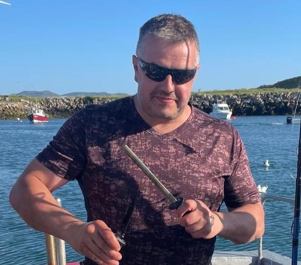 A monster 35ft basking shark was filmed thrashing at the surface off the Irish coast near Donegal, sending onlookers into a frenzy before revealing itself as a harmless plankton feeder.