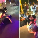 Prankster stages fake motorbike crash to propose to his girlfriend in Lima, Peru - she rushed over in tears before he dropped to one knee and pulled out a ring. She said yes.