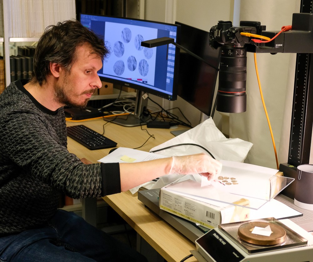 Two metal detector hobbyists have stumbled upon a record-breaking hoard of nearly 3,000 Anglo-Saxon and Viking silver coins in a field in eastern Norway.