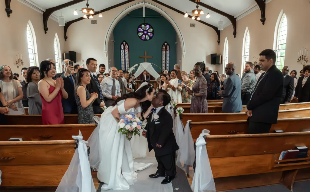 A 4ft man with dwarfism reveals how he won over his 5ft 4in wife after their wedding went viral. His top dating tip - start in the friendzone and let real connection grow.