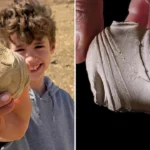 Eight year old boy accidentally uncovers a rare ancient artefact believed to date back nearly 2,000 years while out on a family hike with his dad.