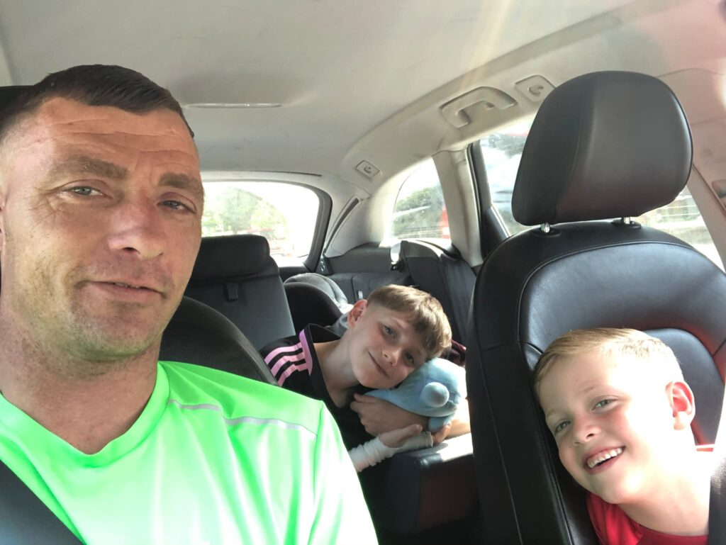 Mancunian dad Liam Tandy, 40, has gone viral after transforming his back garden into a mini waterpark with a huge twisty slide for his boys.