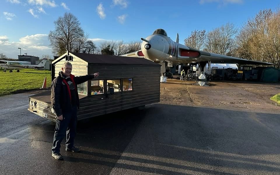 A Brit built the world's only road-legal motorised shed from a broken Volkswagen Passat and has now blasted it across a Welsh beach at nearly 100mph in a new record run.