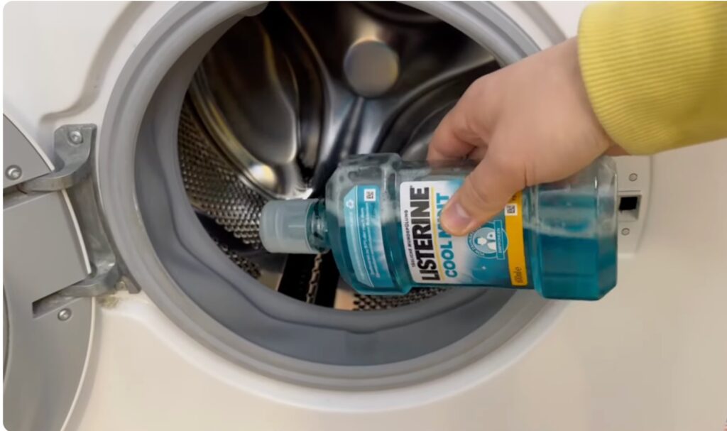 Cheap 20p mouthwash hack could banish bad smells from your washing machine - appliance expert reveals simple trick using antibacterial ingredients to freshen drum.