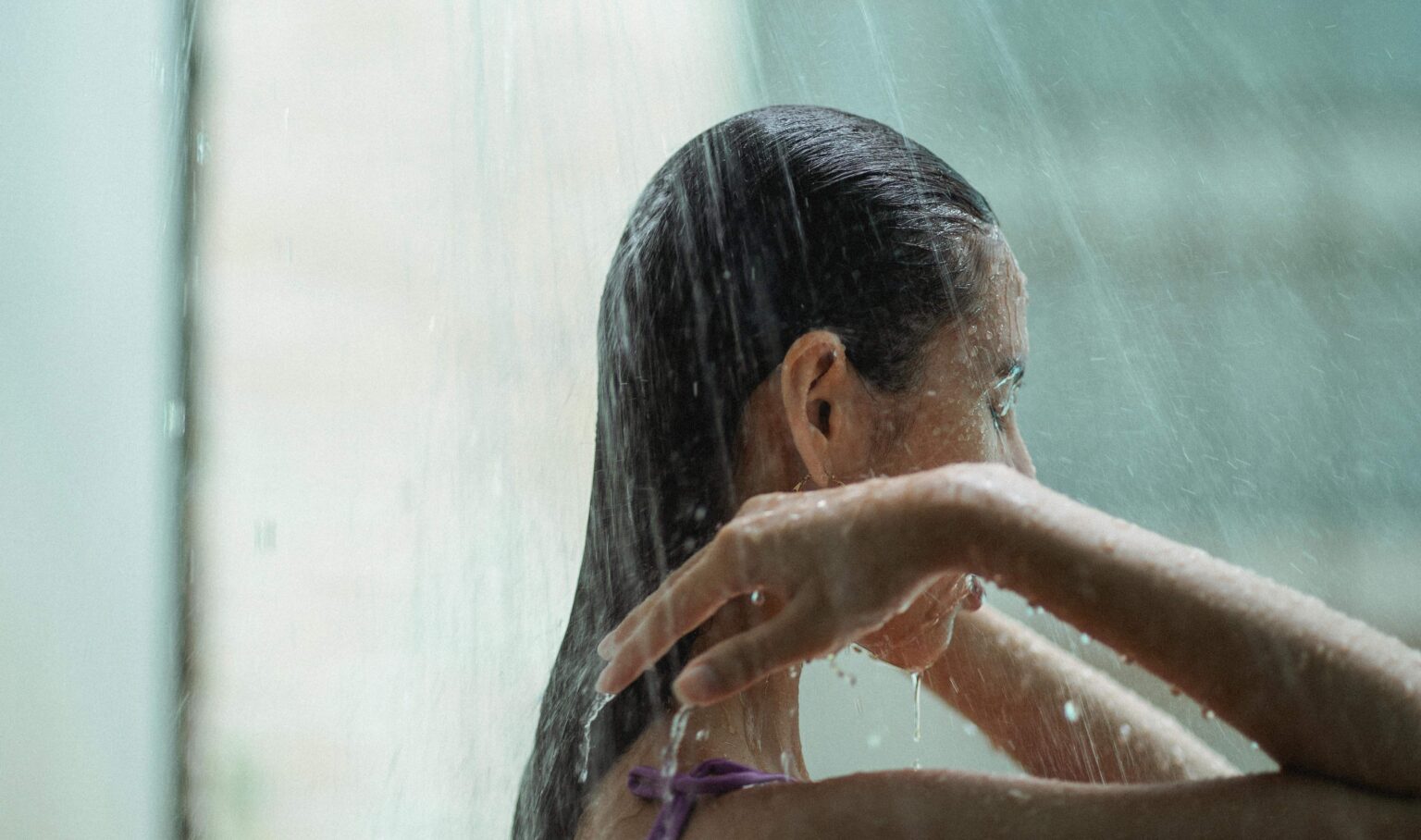 A shower expert says keeping washes to six minutes by timing them to a song could slash household bills by up to £300 a year, with most Brits unaware of how much water they waste.