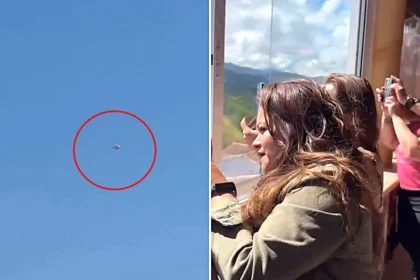 Stunned spiritual retreat group film mysterious metallic UFO with glowing yellow core hovering above Colombia, sparking fierce debate over alien proof.