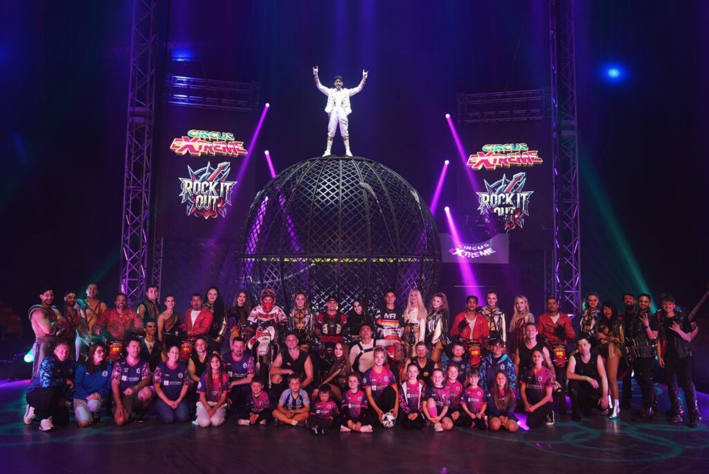 Welsh teen Carly Buchanan-Thomas, 18, smashes world-first football stunt completing 23 keepy-uppies inside Circus Extreme's terrifying globe of death at Cardiff City FC.