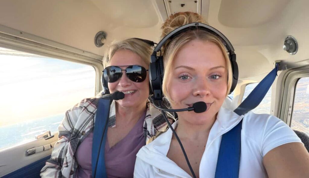 Pilot Sophia Gehlhar, 27, flew her terrified mum Stephanie for the first time in heartwarming viral video, honouring her mum's late friend Christine's pilot legacy.