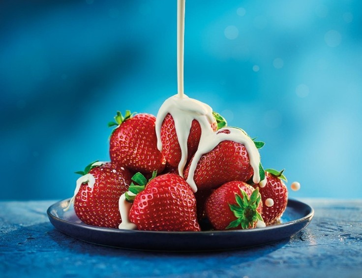Aldi is giving away thousands of free strawberries at its Wimbledon store and cutting British strawberries to just 99p nationwide as Wimbledon gets underway