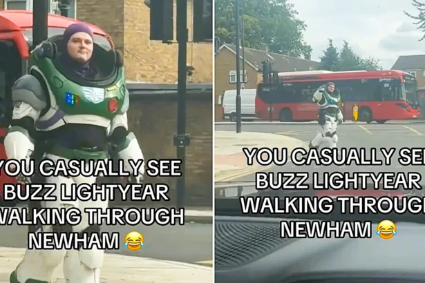 A real-life Buzz Lightyear stunned passers-by as he strolled along a busy London street in full space ranger suit, casually saluting at a passing bus while waiting to cross the road.