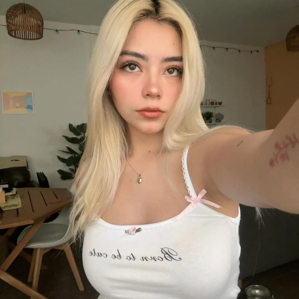 A Sabrina Carpenter lookalike fooled World Cup fans in Mexico City by strutting around with a giant hot dog - and stopping for selfies before anyone realised it was fake.