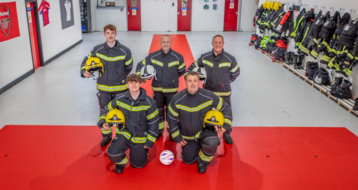 Blackpool Airport firefighters have transformed their station into a mini England fan zone - rolling out a giant St George's Cross and decorating the walls with their club shirts.