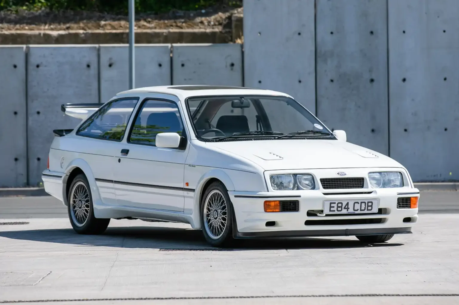 A Ford Sierra Cosworth that sold for £16,000 in 1987 is now on sale for £200,000 - the diamond white RS500 has just 16,700 miles and is one of the most original ever found.