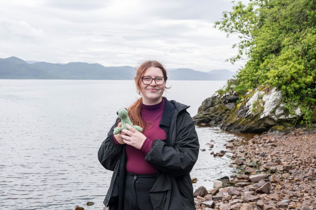Hi-tech underwater robot searching Loch Ness successfully tracks down iconic Nessie film prop hidden beneath murky depths as monster hunters descend from around the world.