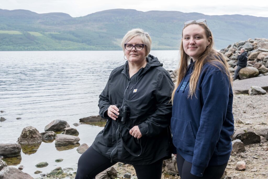 Hi-tech underwater robot searching Loch Ness successfully tracks down iconic Nessie film prop hidden beneath murky depths as monster hunters descend from around the world.
