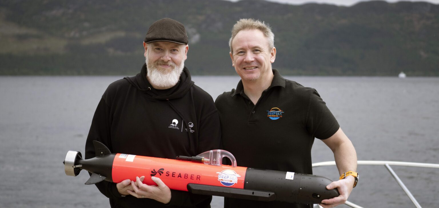 Hi-tech underwater robot searching Loch Ness successfully tracks down iconic Nessie film prop hidden beneath murky depths as monster hunters descend from around the world.