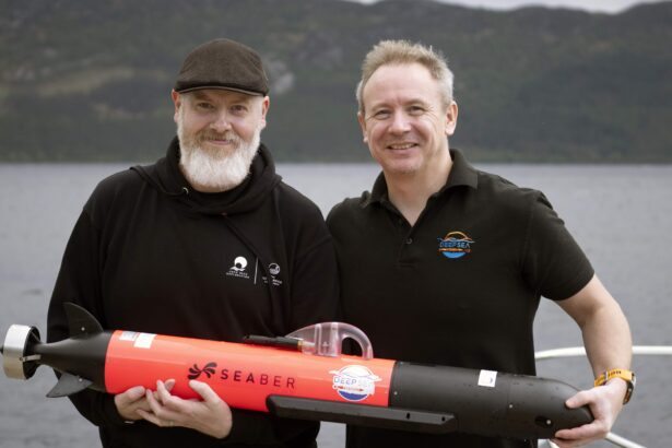 Hi-tech underwater robot searching Loch Ness successfully tracks down iconic Nessie film prop hidden beneath murky depths as monster hunters descend from around the world.