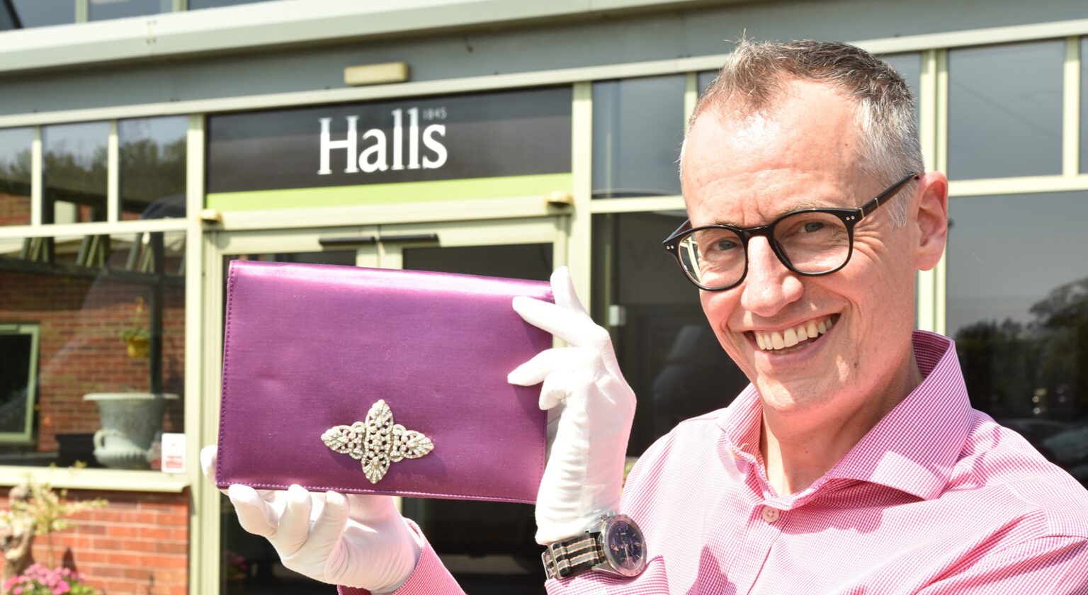 A mauve satin evening clutch owned by Margaret Thatcher - the accessory that spawned the term "handbagging" - is heading to auction with a £6,000 estimate.A mauve satin evening clutch owned by Margaret Thatcher - the accessory that spawned the term "handbagging" - is heading to auction with a £6,000 estimate.