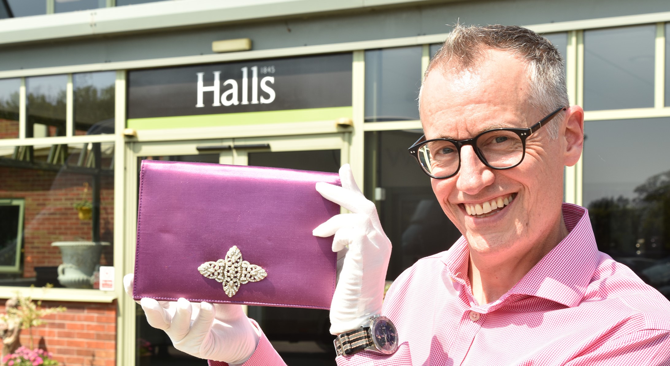 A mauve satin evening clutch owned by Margaret Thatcher - the accessory that spawned the term "handbagging" - is heading to auction with a £6,000 estimate.A mauve satin evening clutch owned by Margaret Thatcher - the accessory that spawned the term "handbagging" - is heading to auction with a £6,000 estimate.