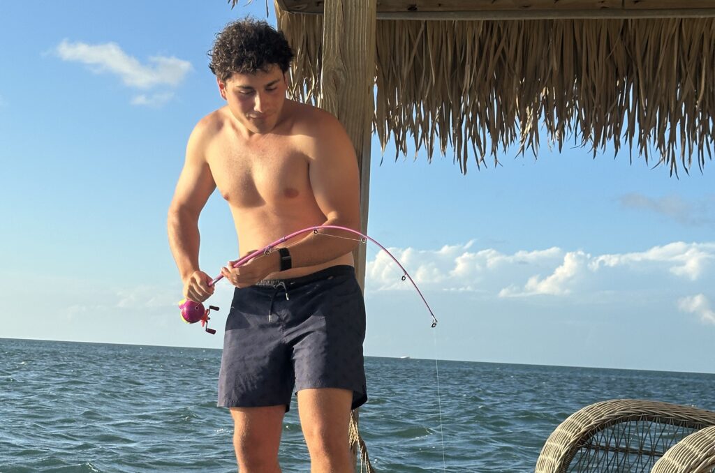 Influencer flew 10 hours then sailed into open sea to stay at the 'world's most isolated hotel' - a shark-surrounded floating cabin closer to Cuba than Miami.