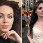 A Russian influencer and aspiring actress has gone viral with fans branding her the "Russian Angelina Jolie" after a black coat and bold makeup look racked up millions of views.