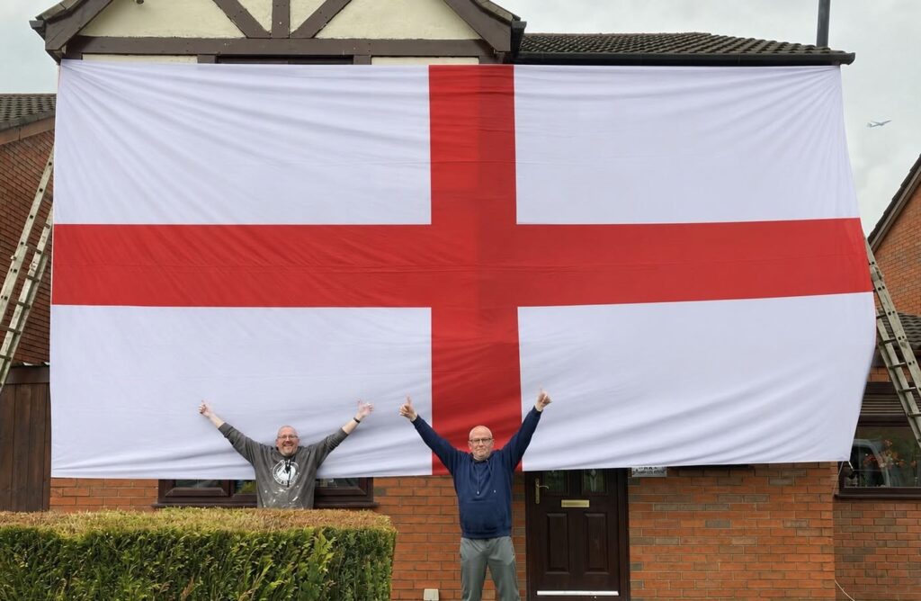 A lucky Brit has won a monster 24ft England flag wide enough to cover his entire house front - described as the length of three-and-a-half Peter Crouchs laid end to end.