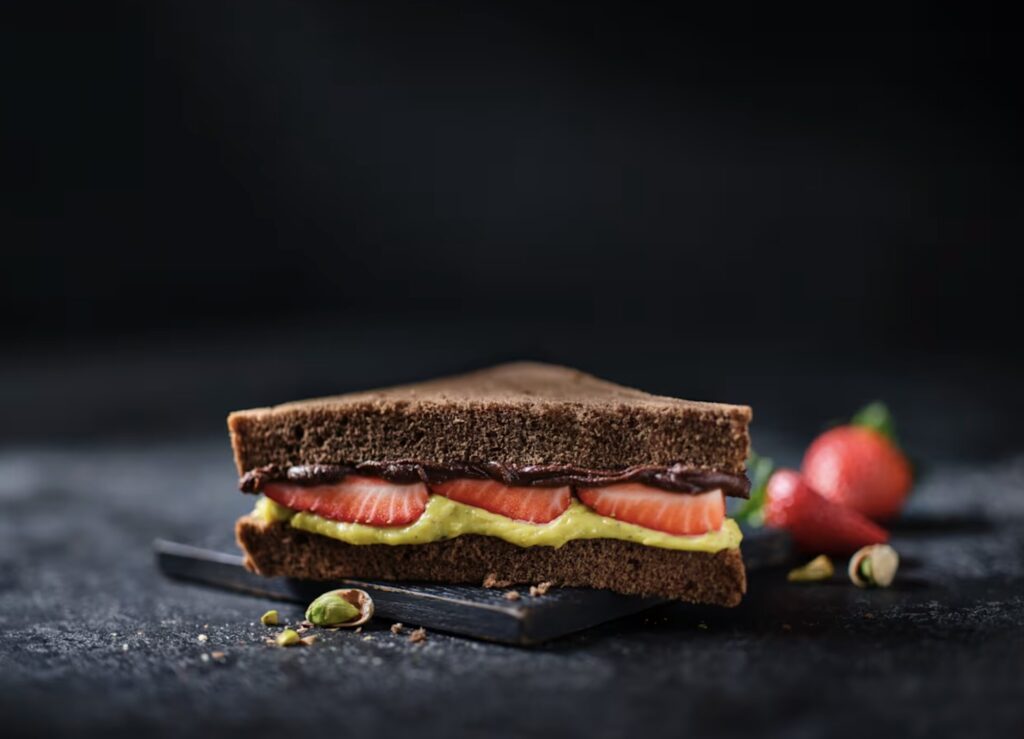 Marks & Spencer brings back its viral strawberry sandwich and launches a new chocolate, strawberry & pistachio version, sending shoppers into a frenzy.