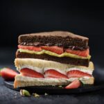 Marks & Spencer brings back its viral strawberry sandwich and launches a new chocolate, strawberry & pistachio version, sending shoppers into a frenzy.